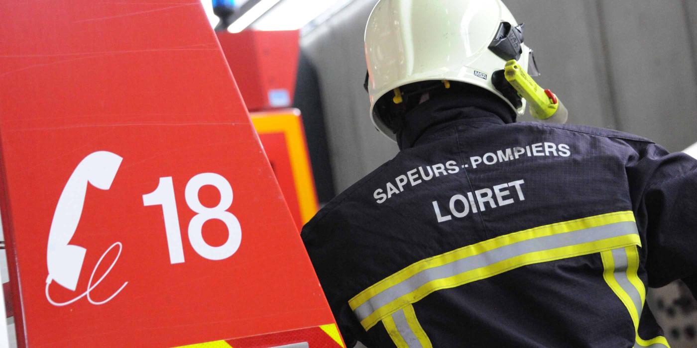 Sapeurs-pompiers : toujours opérationnels - Sapeur-pompier avec le logo 18/112