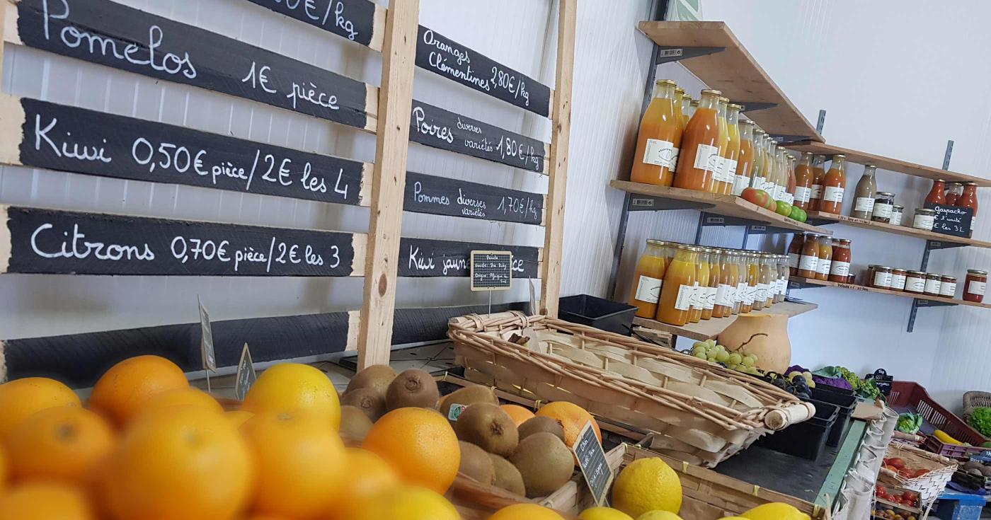 La Racinerie, une histoire de famille ! magasin avec oranges